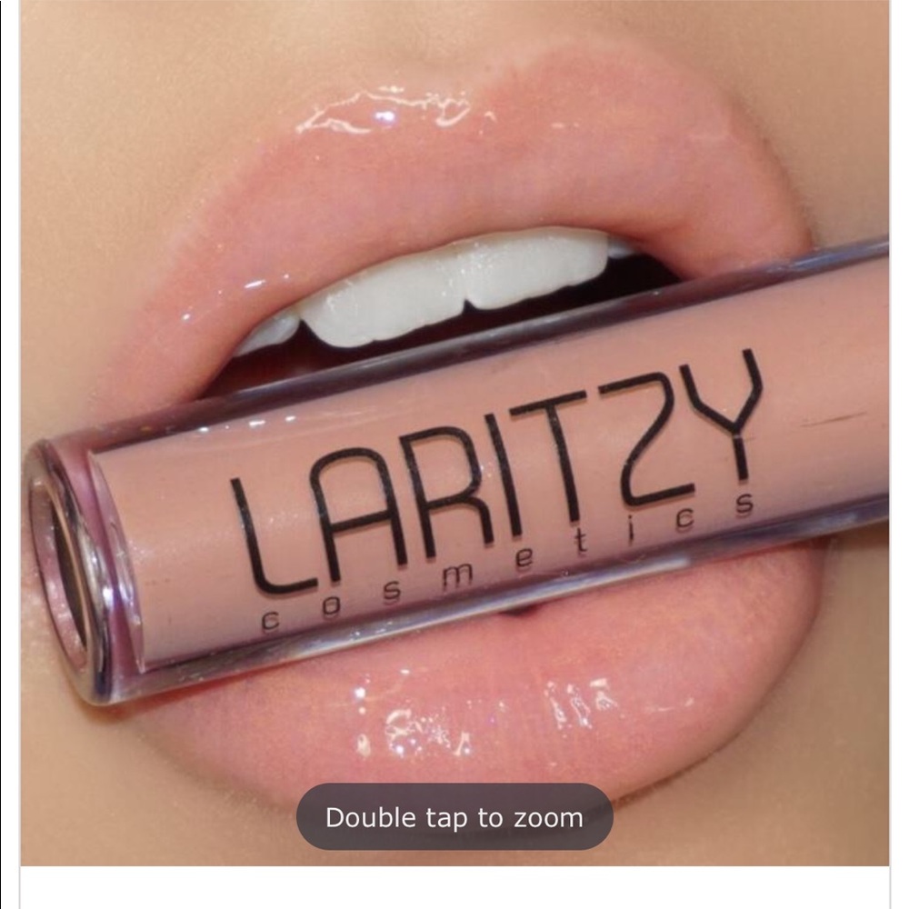 Brand new full size Laritzy Lip Gloss in “Vibe”